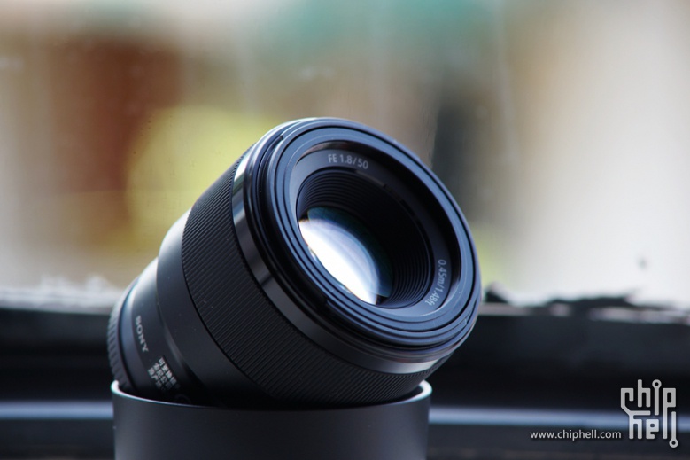 这个小痰盂略贵索尼fe50f18